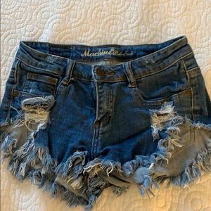 Low rise distressed cut off shorts
